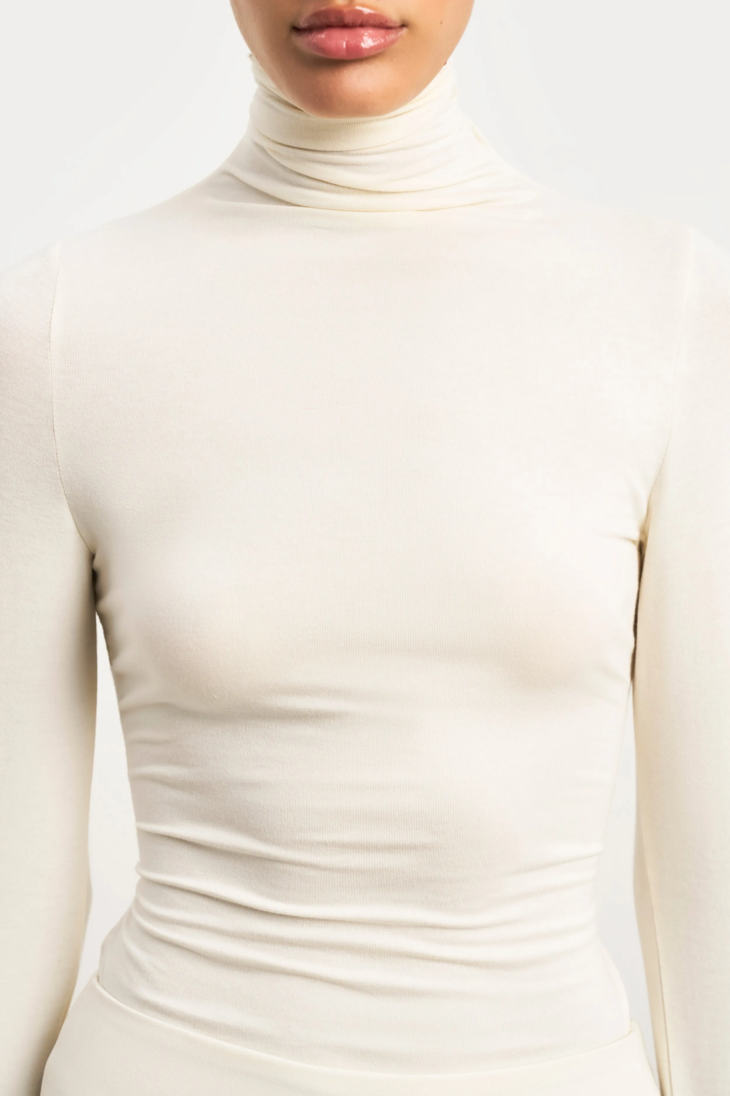 Airflow Weave Pattern Snag Resistant Fabric Semi Sheer High Neck Longsleeve Top -  Cream