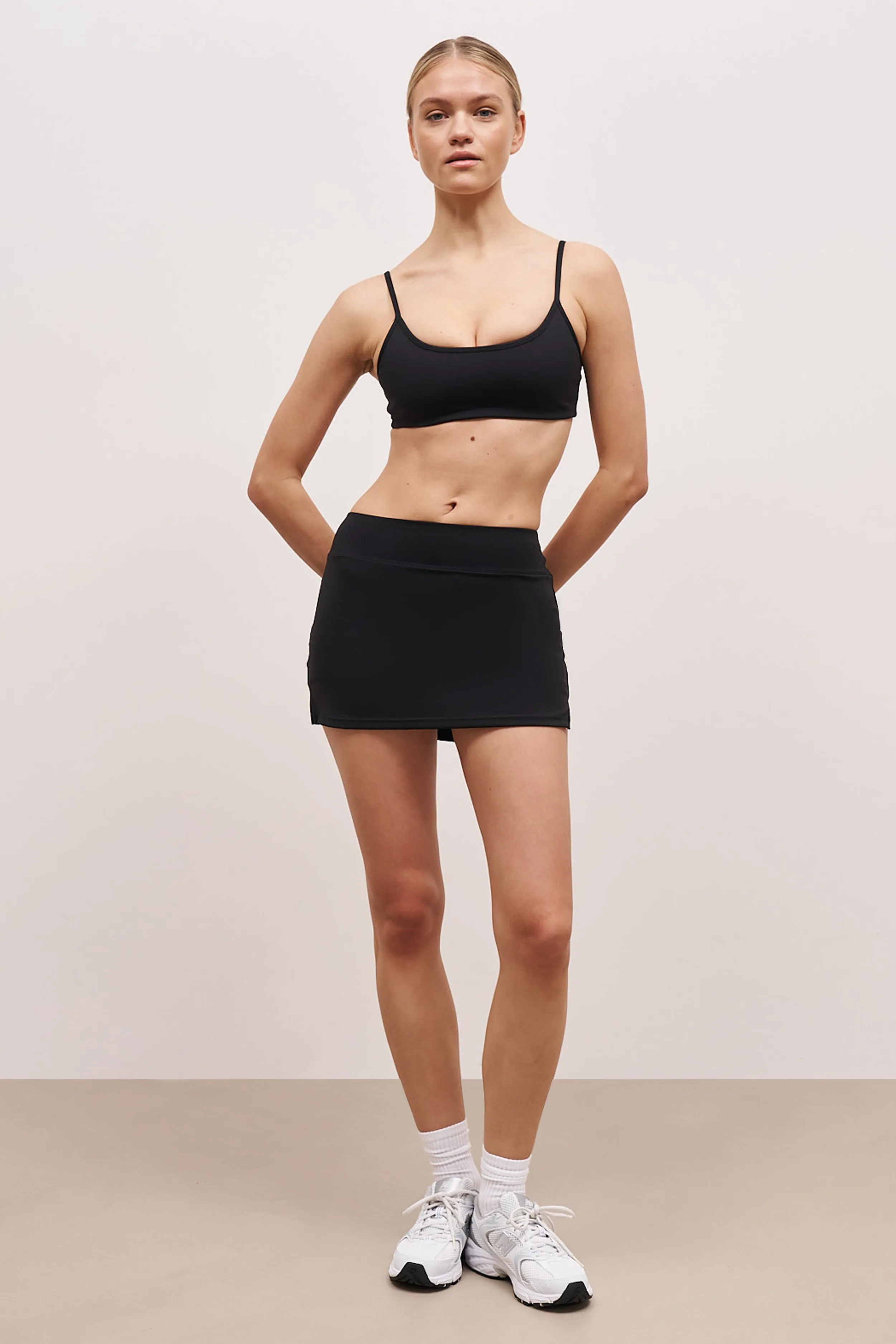 watch accents Convenient Base Sculpting Tennis Skort - Black