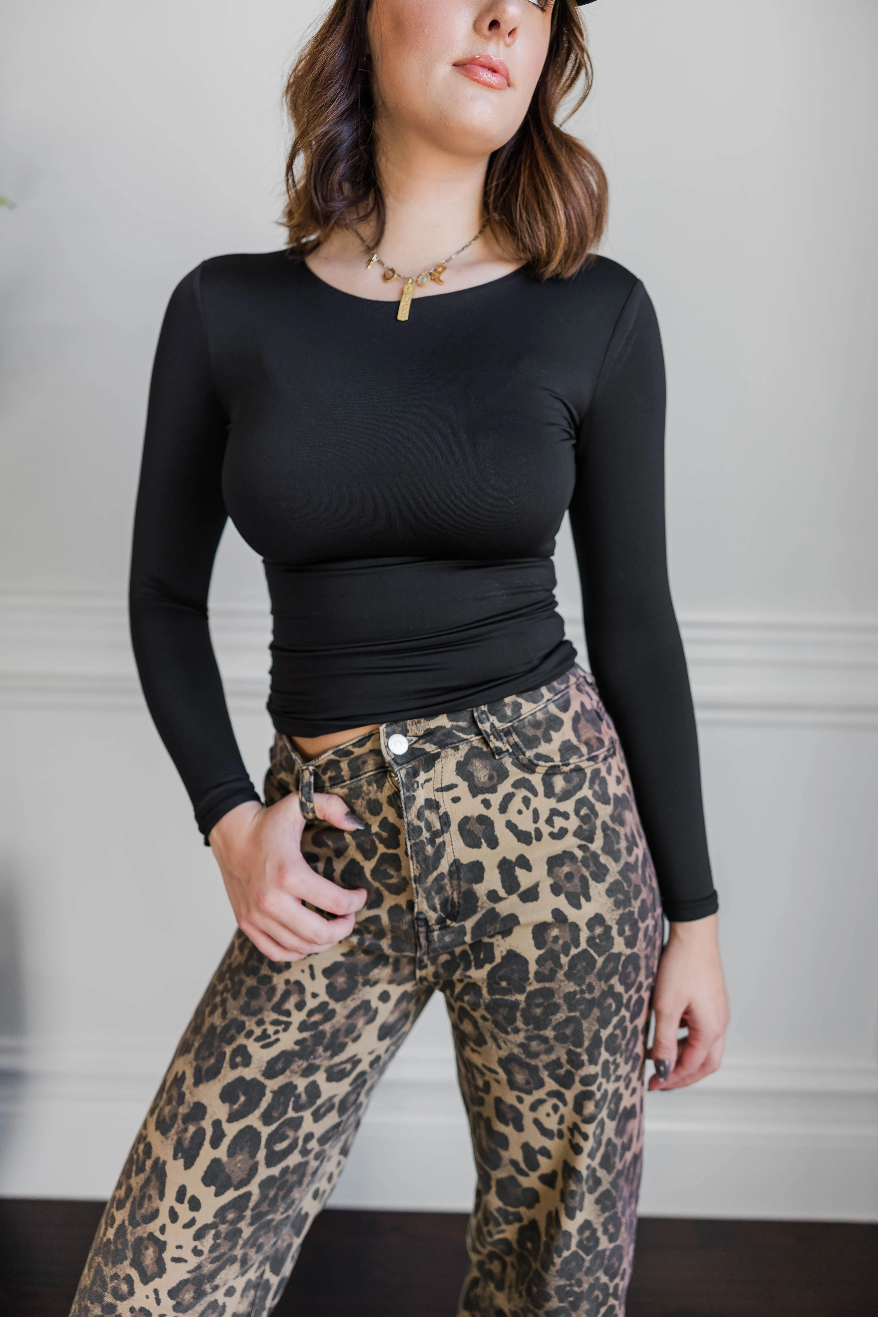 Heather Effect Finish Variable Tension Adjustment Blackout Seamless High Neck Top