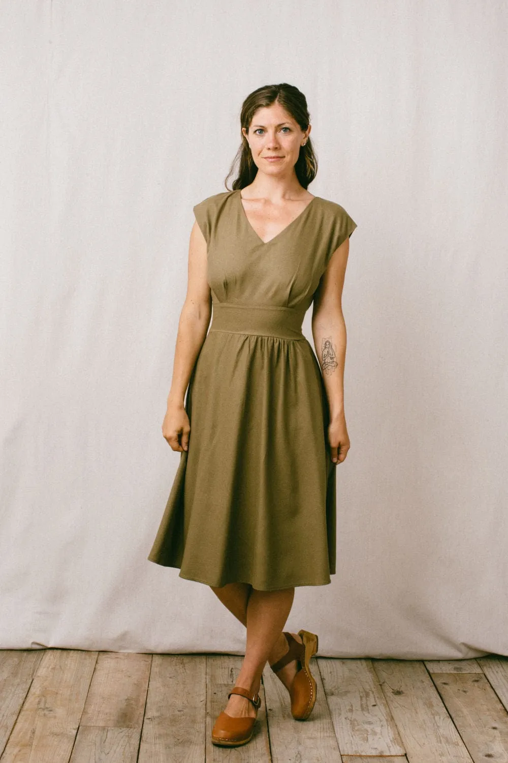 Joy dress in Olive Raw Silk Feminine fit-and-flare silhouette
