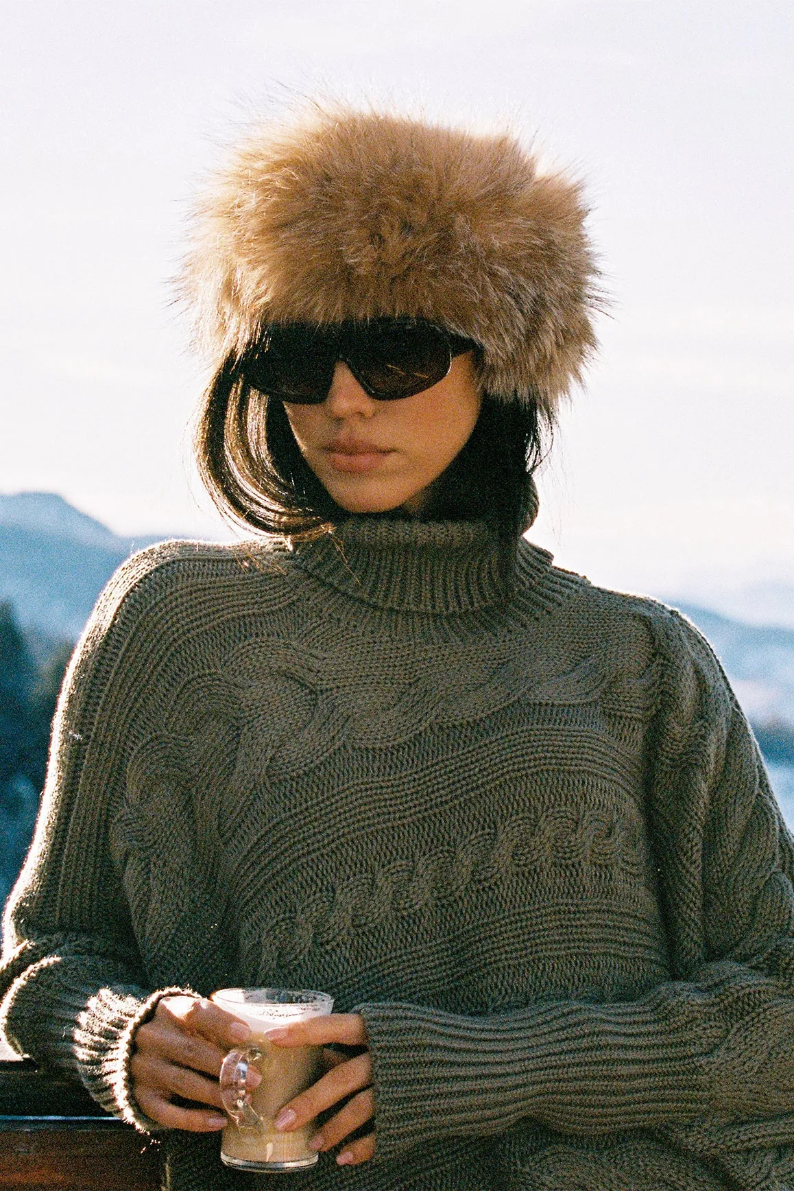 VentilatedBackPanel MoistureManagementSystem Cable Knit Cape Sweater