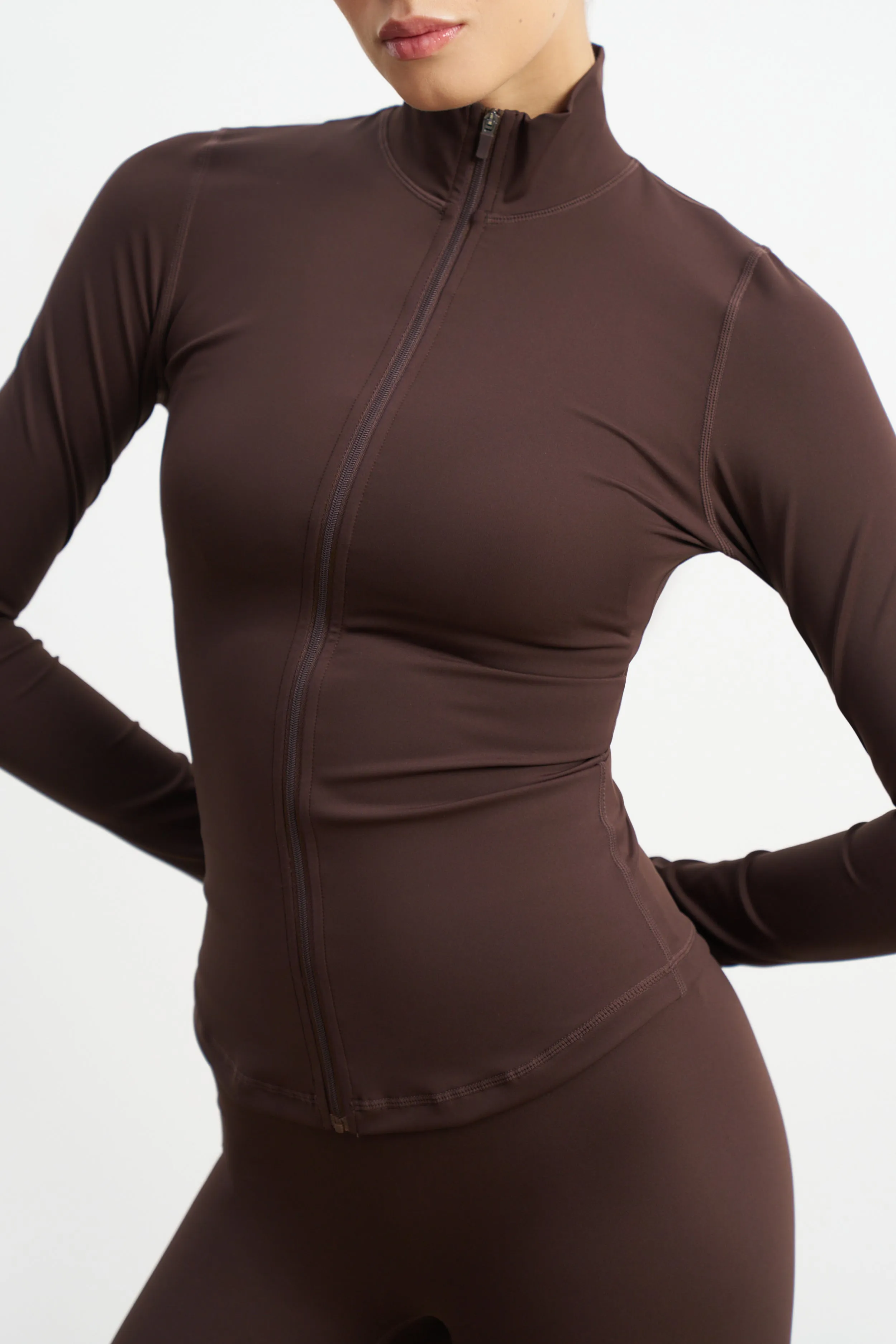 Base Sculpting Zip Up Jacket - Carob RubberizedGrip Reflective accents